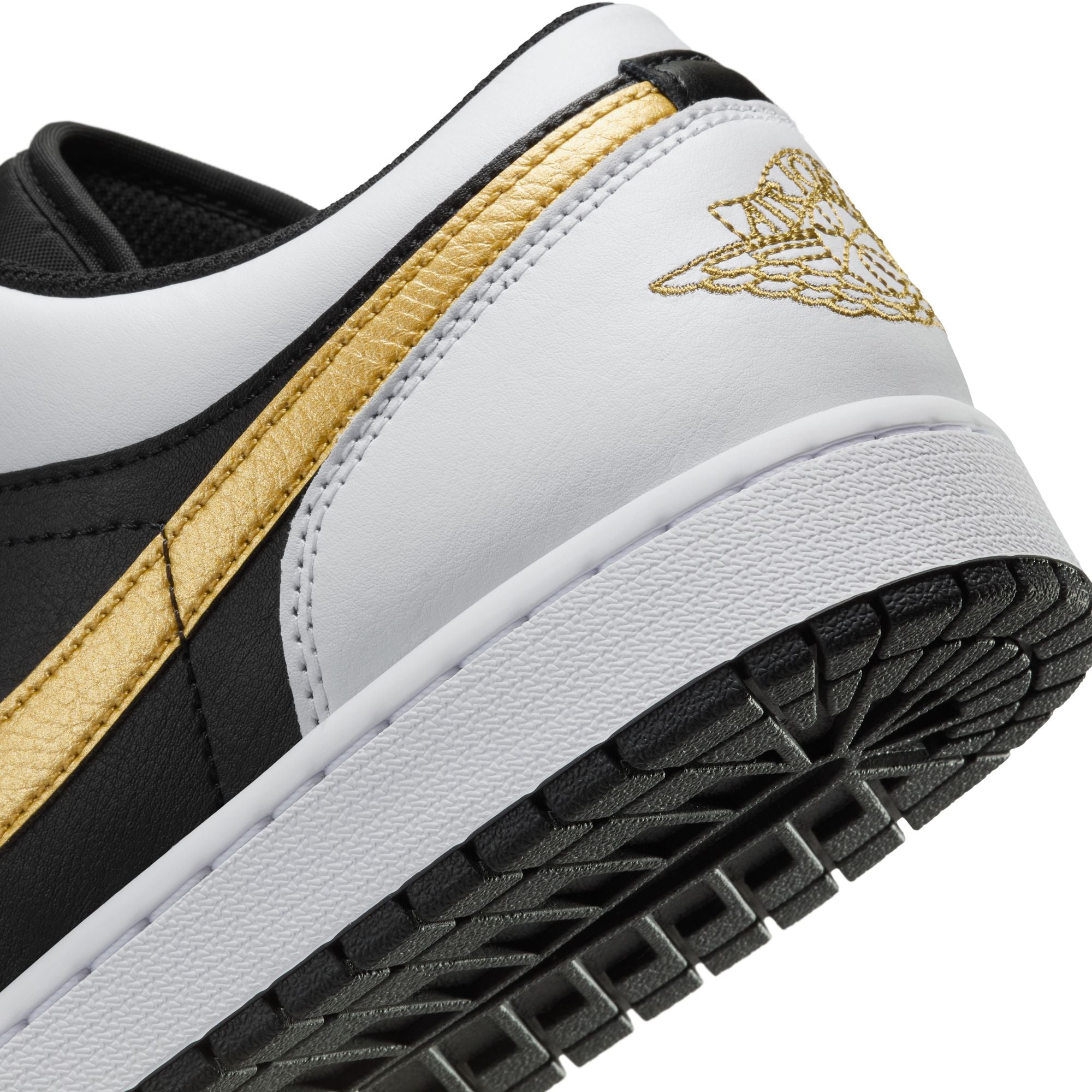 Nike air jordan 1 low black gold hotsell