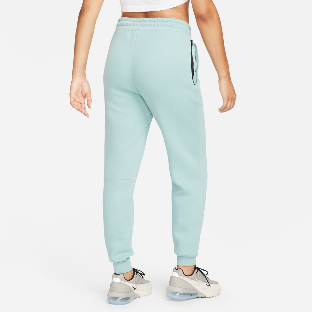 Nike fleece flare joggers and sweatshirt in Teal - Depop